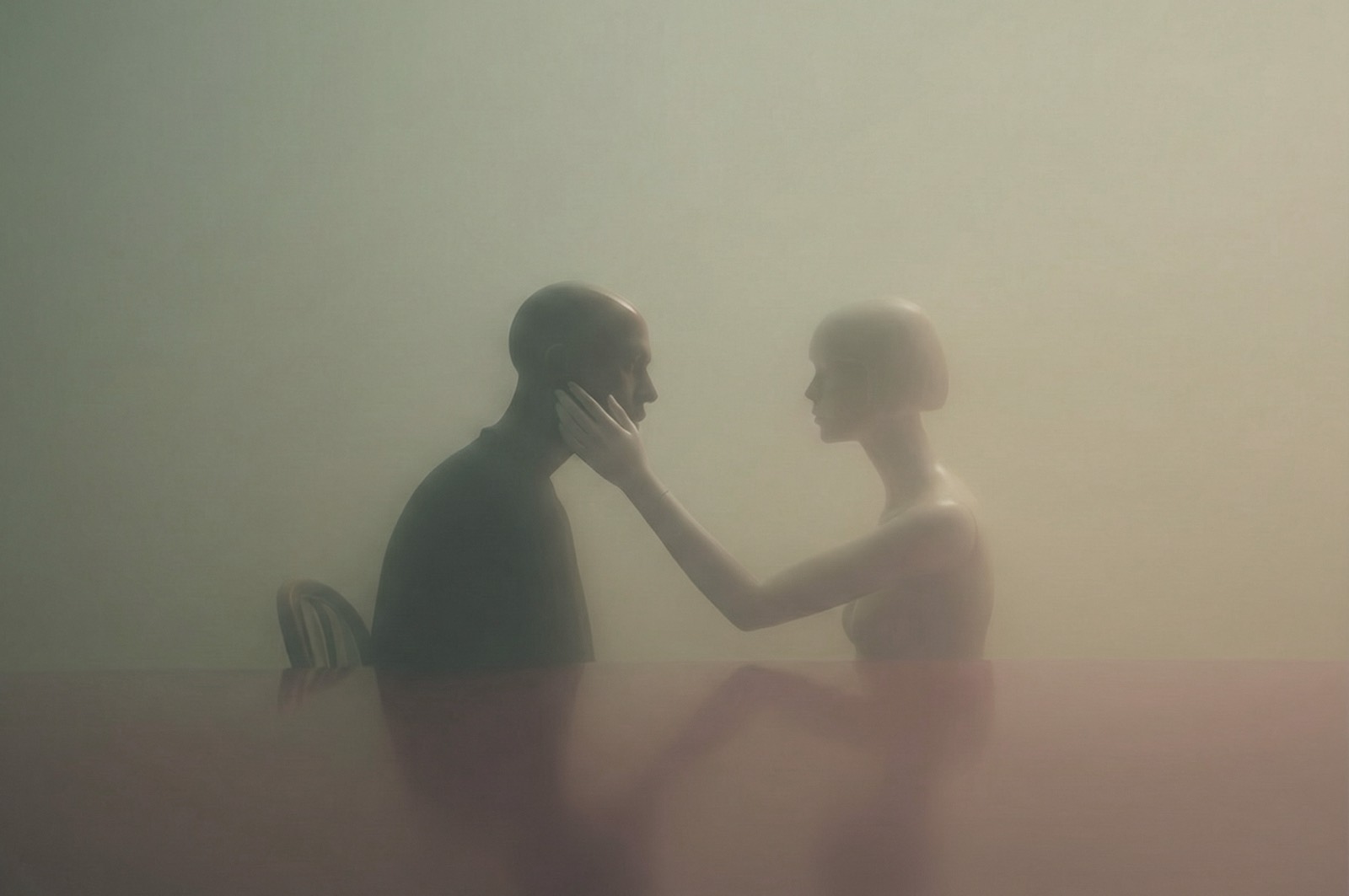 A man and a robotic mannequin surrounded by mist. The mannequin reaches out to touch the man’s face in a gesture of comfort.